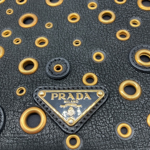 PRADA BLACK / GOLD GROMMET EMBELLISHED LOGO PLAQUE GRAINED LEATHER HANDBAG - Picture 5 of 13